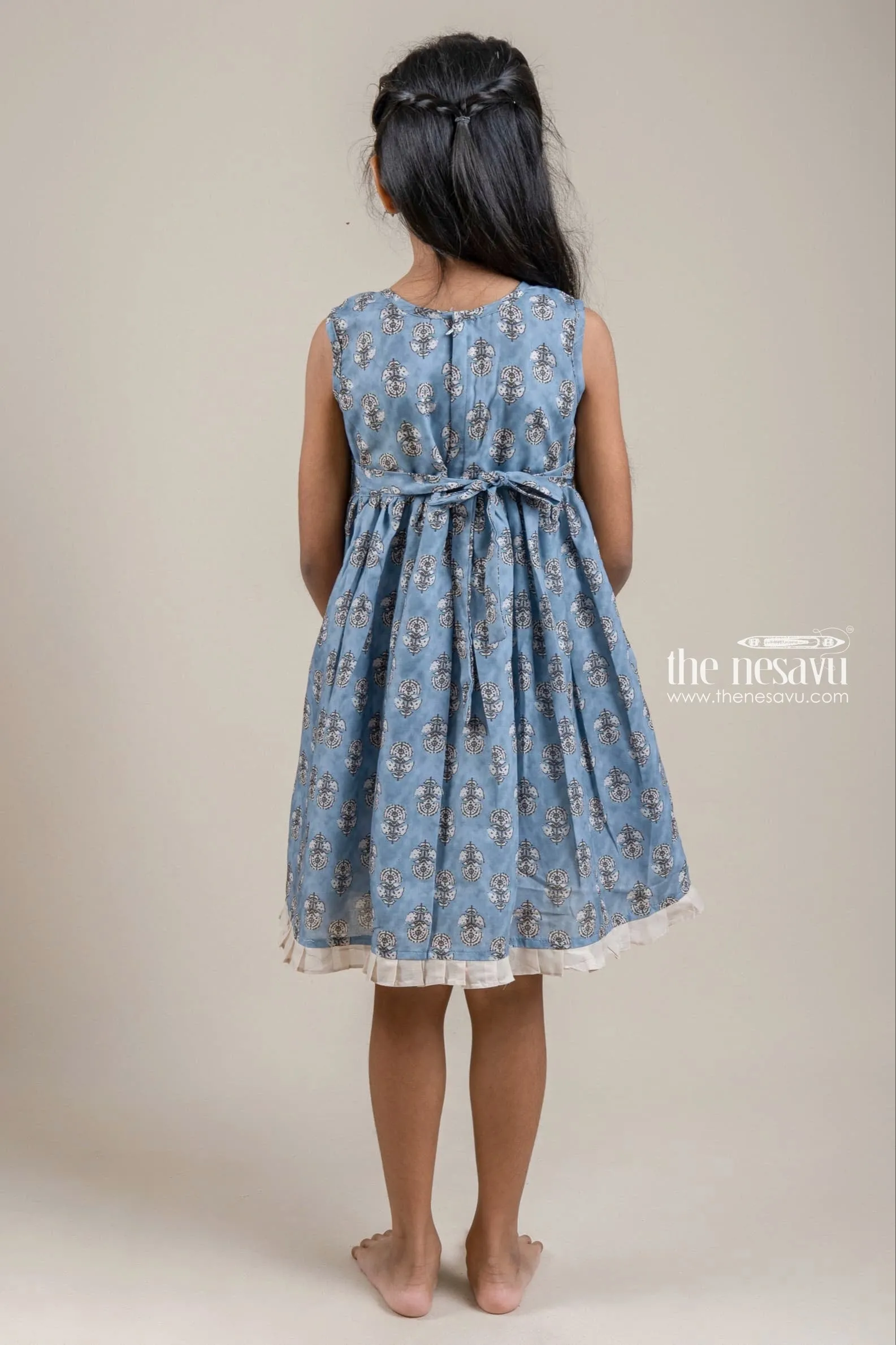Adorable Hand Block Printed Sleeveless Blue Cotton Frock with Embellished Potli Button for Girls