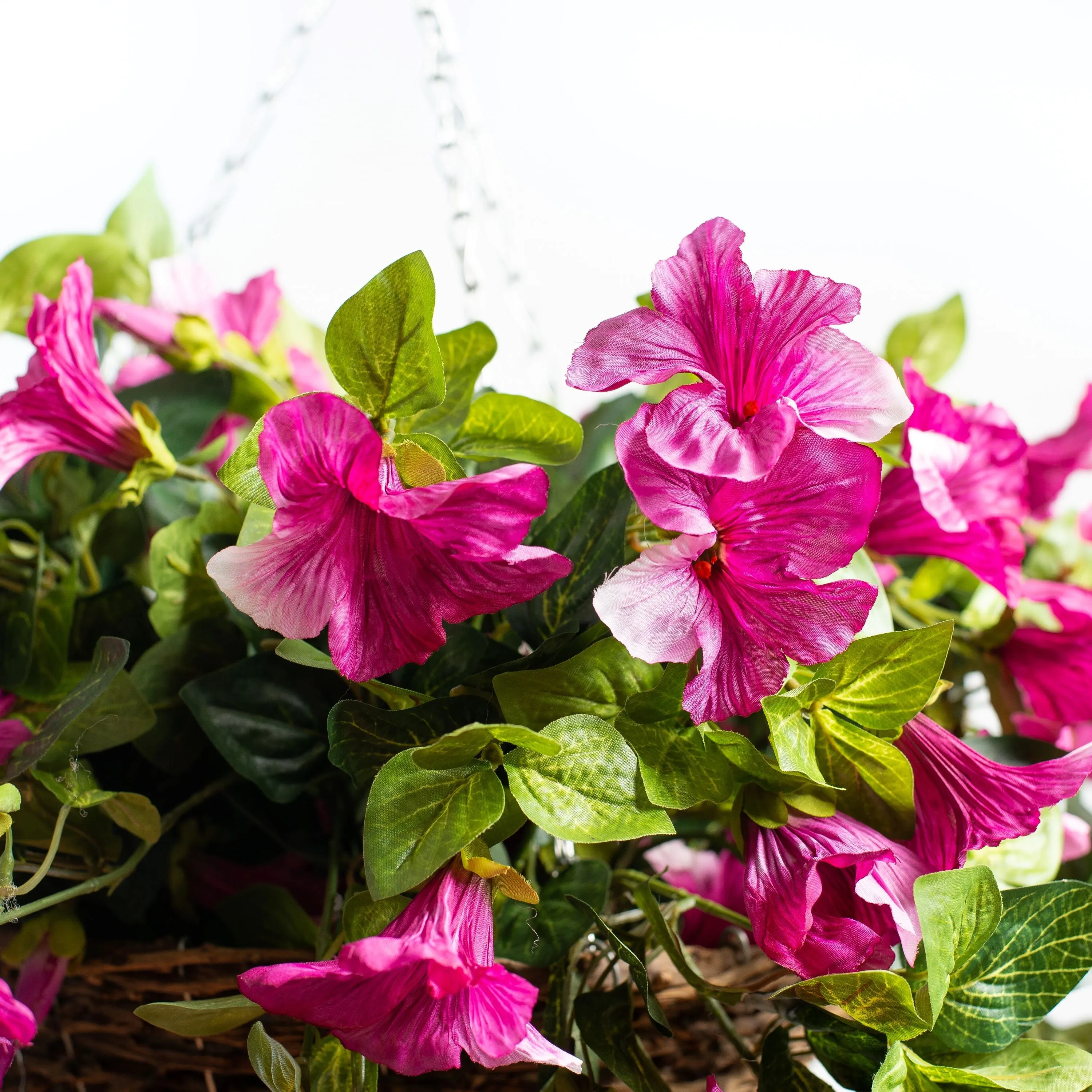 Cascading Petunia Artificial Plant in Round Rattan Hanging Basket - Available In 3 Colors